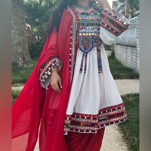 White ethnic Afghan clothes heavy chest work with red pants and scarf